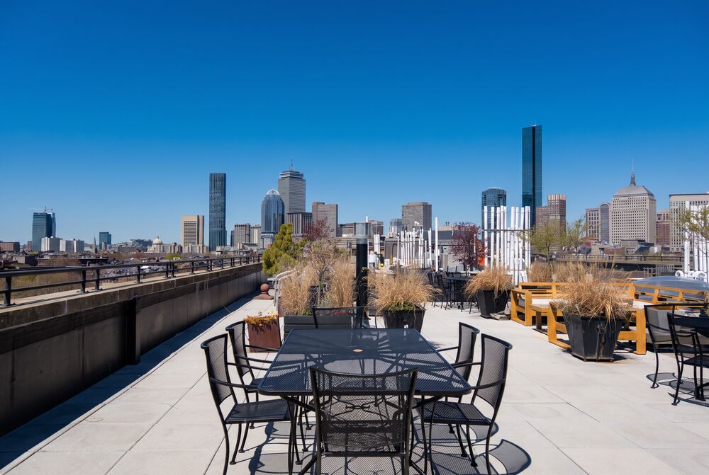 rooftop views — city skyline · open air